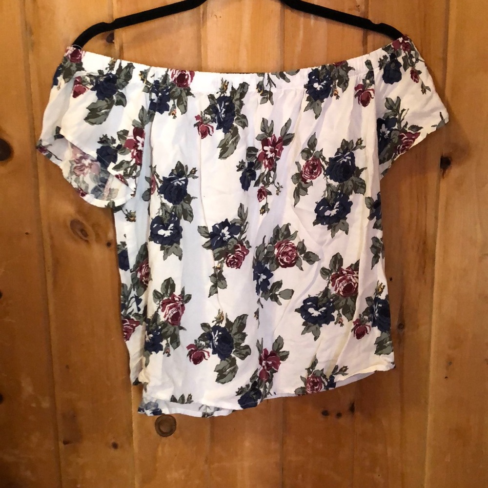 Off the shoulder floral shirt.